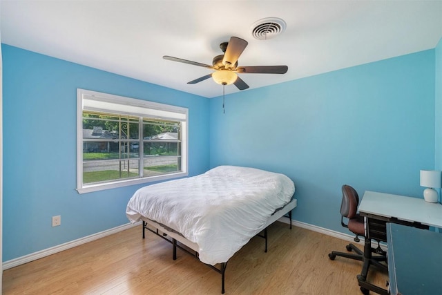 420 Hale St, Lexington, TX 78947 - bedroom featuring wood finished floors, a ceiling fan, and an office area