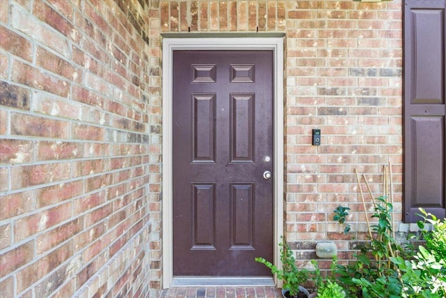 2025 Cliffbrake Way, Georgetown, TX 78626 - doorway to property featuring brick siding