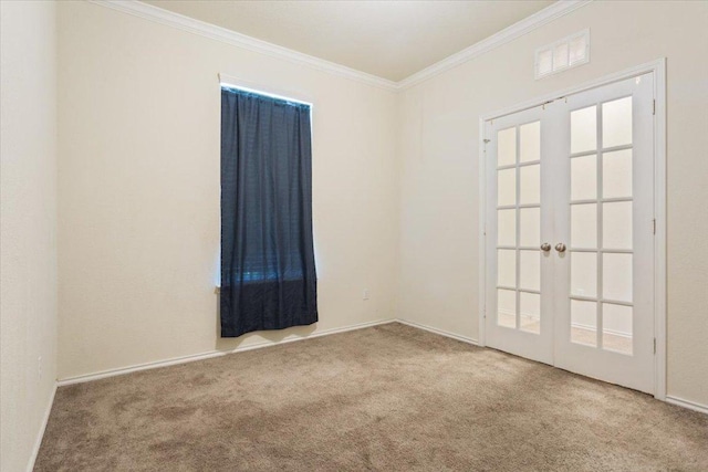 2025 Cliffbrake Way, Georgetown, TX 78626 - spare room featuring ornamental molding, french doors, and carpet flooring