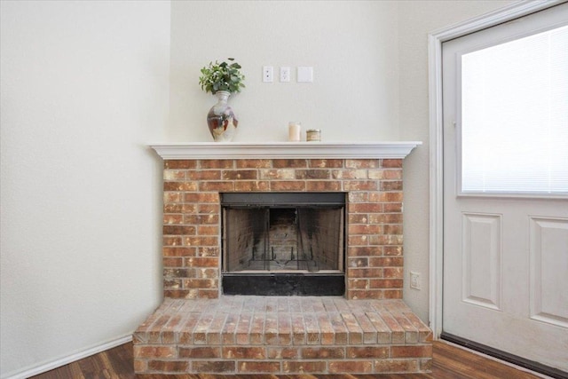 2025 Cliffbrake Way, Georgetown, TX 78626 - detailed view of wood finished floors and a fireplace
