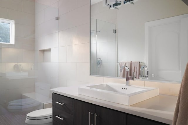 5301 Maryanna Dr, Austin, TX 78746 - bathroom with vanity, tile walls, and tiled shower
