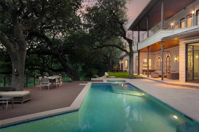 5301 Maryanna Dr, Austin, TX 78746 - view of pool with outdoor dining space, a deck, and a pool with connected hot tub