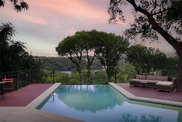 5301 Maryanna Dr, Austin, TX 78746 - view of pool featuring a wooden deck and an infinity pool