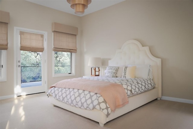 5301 Maryanna Dr, Austin, TX 78746 - bedroom with access to outside and carpet floors