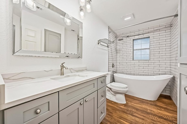2802 Brandy Ln, Georgetown, TX 78628 - full bath featuring vanity and wood finished floors