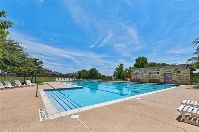 1436 Biscuit Dr, Austin, TX 78754 - community pool with a patio area