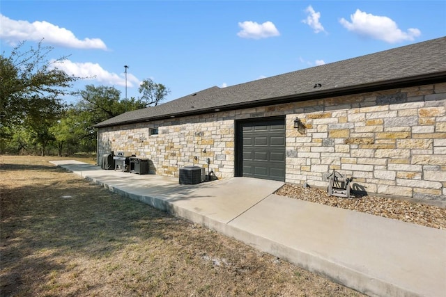 106 Chaumont St, Kingsland, TX 78639 - exterior space with stone siding