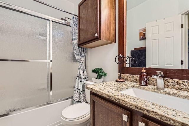 803 Ranchero Rd, Leander, TX 78641 - bathroom featuring vanity and shower / bath combination with glass door