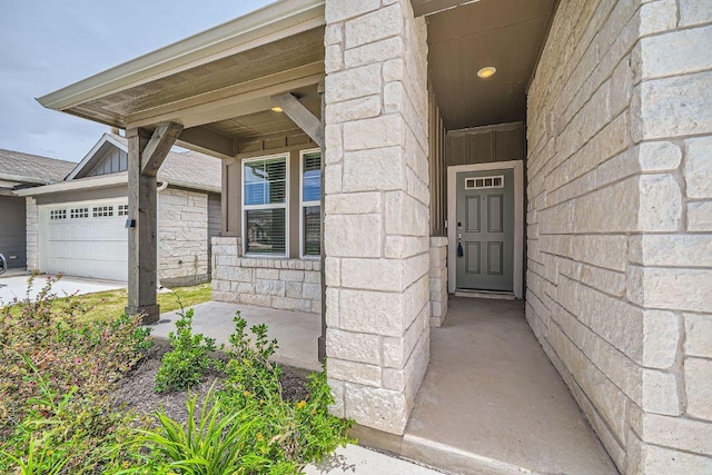 2871 Mill Run Bnd, Round Rock, TX 78665 - entrance to property with stone siding and a garage