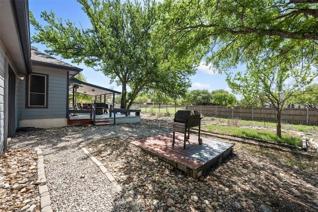 401 N Fox Xing, Burnet, TX 78611 - fenced backyard featuring a sunroom