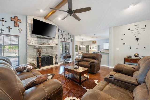 401 N Fox Xing, Burnet, TX 78611 - living area with ceiling fan, wood finished floors, and a fireplace