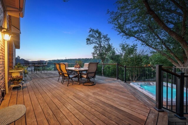 10008 Inshore Dr, Austin, TX 78730 - deck with outdoor dining space and a pool