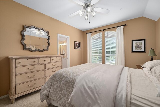 10008 Inshore Dr, Austin, TX 78730 - bedroom featuring light colored carpet, vaulted ceiling, and a ceiling fan