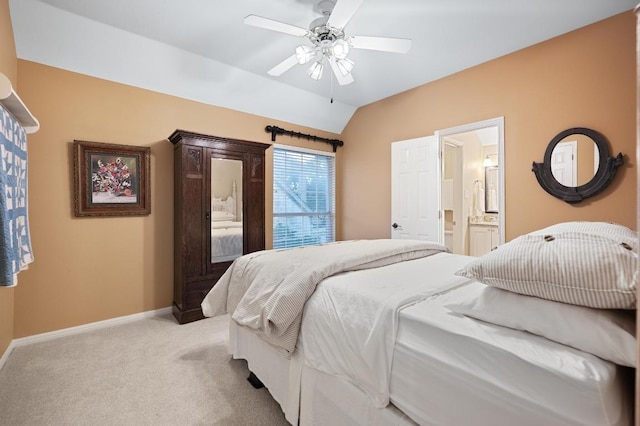 10008 Inshore Dr, Austin, TX 78730 - bedroom featuring light colored carpet, vaulted ceiling, ensuite bath, and a ceiling fan