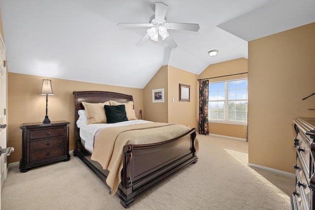 10008 Inshore Dr, Austin, TX 78730 - bedroom featuring light colored carpet, vaulted ceiling, and a ceiling fan