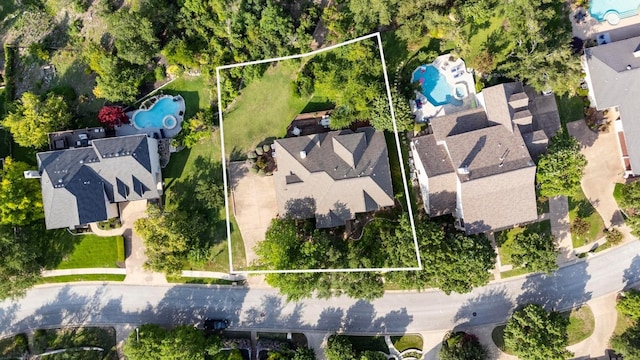 10008 Inshore Dr, Austin, TX 78730 - aerial view of property's location featuring a pool area and property boundaries highlighted