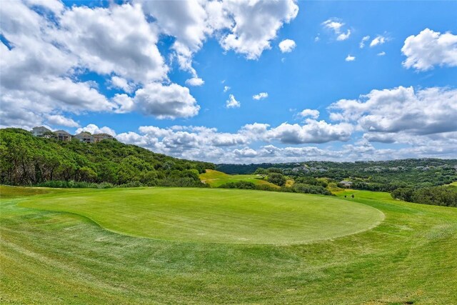 10008 Inshore Dr, Austin, TX 78730 - view of home's community with view of golf course and a lawn
