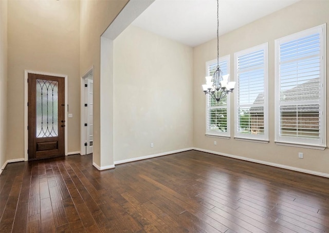 5505 Cypress Ranch Blvd, Spicewood, TX 78669 - foyer with a chandelier and dark wood-style flooring