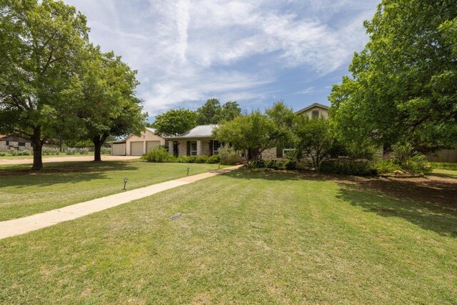 116 Ridgecrest Rd, Georgetown, TX 78628 - view of front of property with a front lawn and a garage