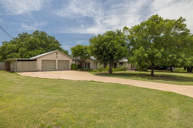 116 Ridgecrest Rd, Georgetown, TX 78628 - view of front facade featuring driveway, a front yard, and a garage
