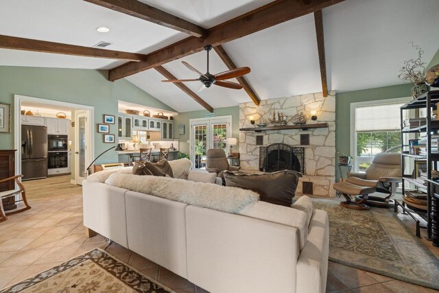 116 Ridgecrest Rd, Georgetown, TX 78628 - living area with light tile patterned floors, a fireplace, and ceiling fan