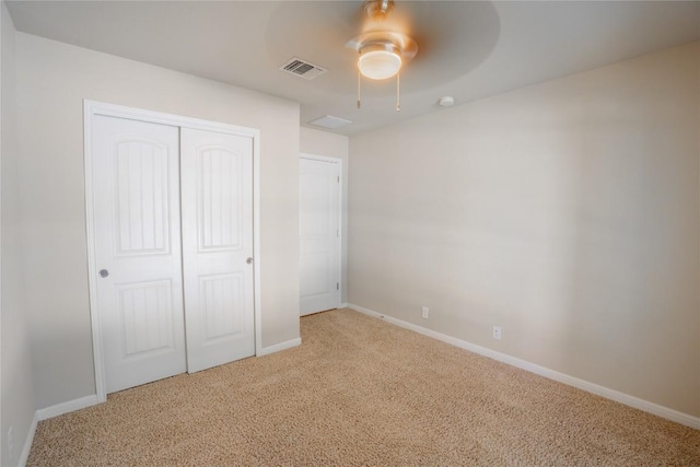 11612 Yeadon Way, Austin, TX 78717 - unfurnished bedroom featuring carpet flooring, a closet, and a ceiling fan