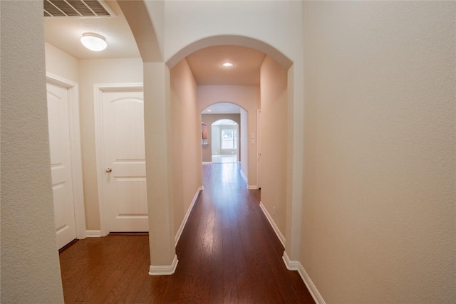 11612 Yeadon Way, Austin, TX 78717 - hall featuring wood finished floors and arched walkways