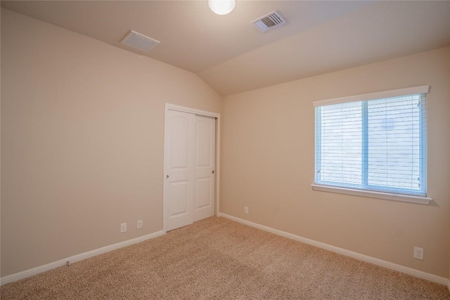 11612 Yeadon Way, Austin, TX 78717 - empty room with carpet flooring and vaulted ceiling