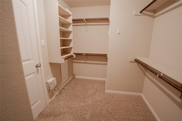 11612 Yeadon Way, Austin, TX 78717 - walk in closet featuring carpet