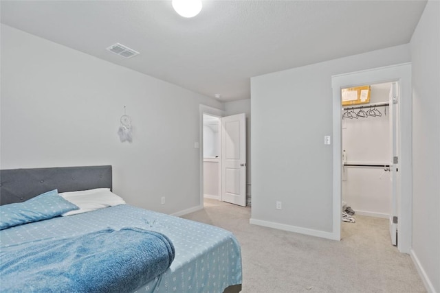 1519 Fenton Hill Dr, Leander, TX 78641 - bedroom featuring carpet and a walk in closet