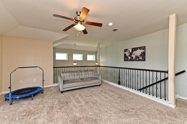 11600 Santa Elena Ln, Austin, TX 78717 - living area featuring carpet flooring, a ceiling fan, and an upstairs landing