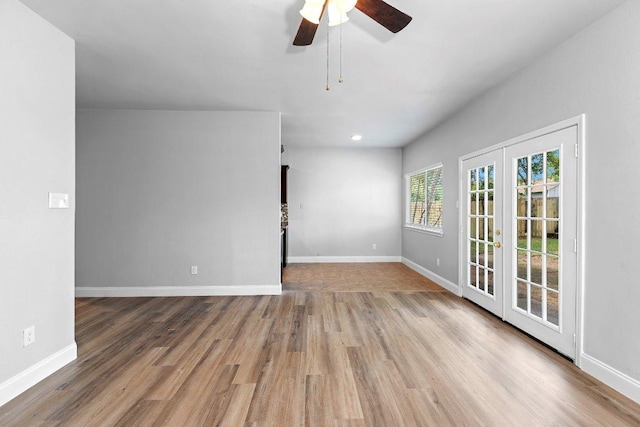 1207 York Castle Dr, Pflugerville, TX 78660 - spare room with wood finished floors, a ceiling fan, and recessed lighting