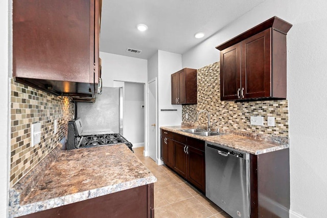 1207 York Castle Dr, Pflugerville, TX 78660 - kitchen featuring dishwasher, decorative backsplash, gas range oven, and dark brown cabinets