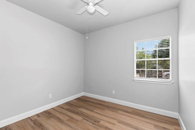 1207 York Castle Dr, Pflugerville, TX 78660 - spare room featuring wood finished floors and ceiling fan