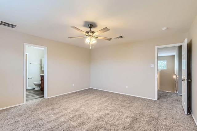 132 Hillhouse Ln, Manchaca, TX 78652 - unfurnished bedroom with carpet flooring, ensuite bath, and ceiling fan