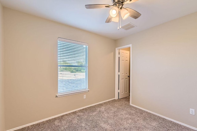 132 Hillhouse Ln, Manchaca, TX 78652 - empty room with carpet floors and ceiling fan