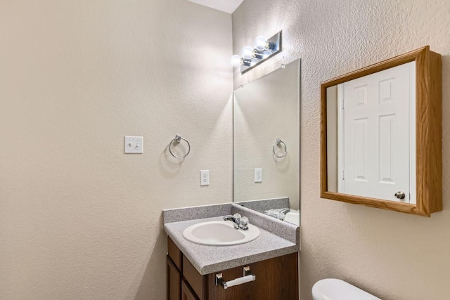 132 Hillhouse Ln, Manchaca, TX 78652 - bathroom with vanity and toilet