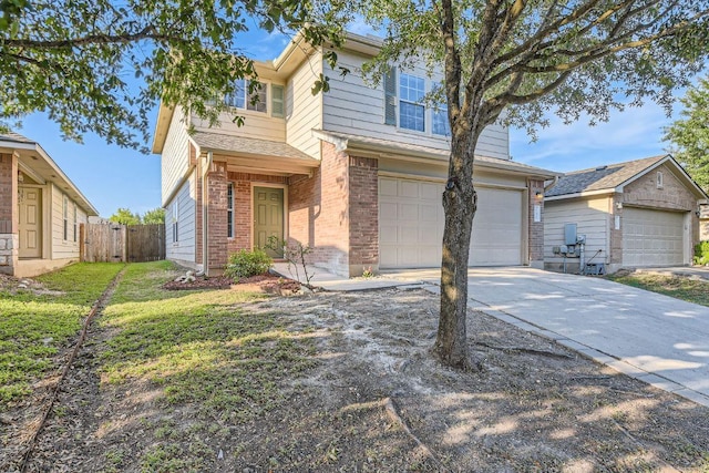 132 Hillhouse Ln, Manchaca, TX 78652 - view of front facade with brick siding, an attached garage, and driveway