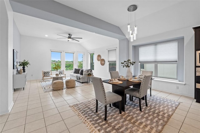 12221 Fairway Cv, Austin, TX 78732 - dining room with vaulted ceiling, light tile patterned floors, and ceiling fan