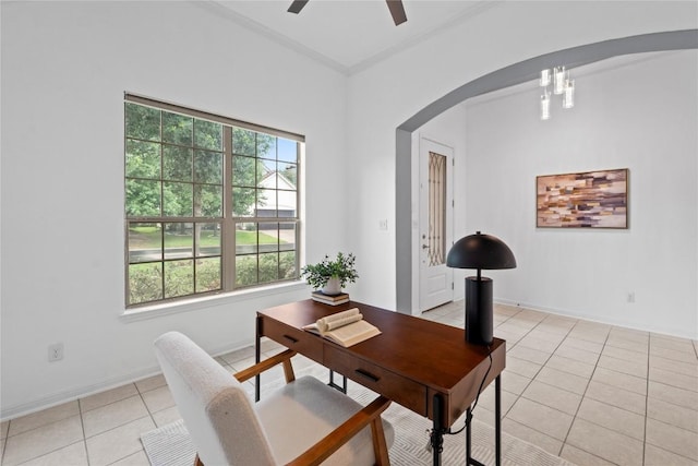 12221 Fairway Cv, Austin, TX 78732 - home office with arched walkways, light tile patterned floors, ceiling fan, ornamental molding, and a chandelier