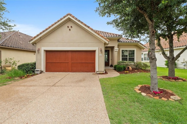12221 Fairway Cv, Austin, TX 78732 - mediterranean / spanish home featuring concrete driveway, an attached garage, a tile roof, a front yard, and stucco siding