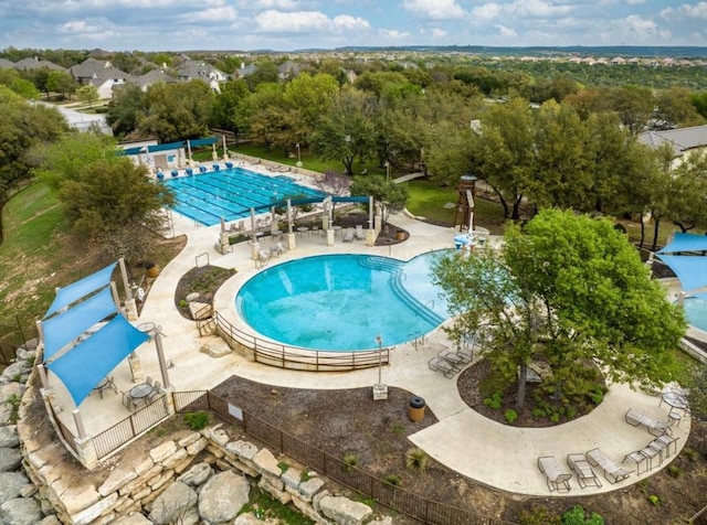 12221 Fairway Cv, Austin, TX 78732 - community pool featuring a patio area
