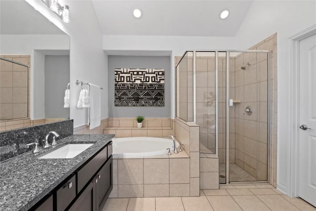 12221 Fairway Cv, Austin, TX 78732 - full bathroom featuring a bath, vanity, a stall shower, tile patterned flooring, and recessed lighting
