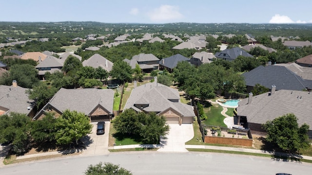 139 Merion Dr, Austin, TX 78737 - aerial perspective of suburban area with a pool