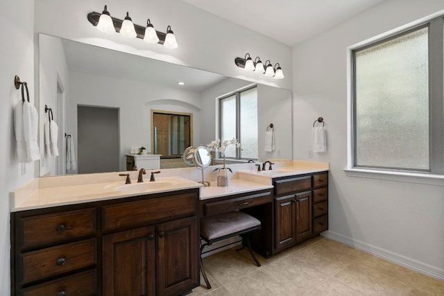 139 Merion Dr, Austin, TX 78737 - bathroom featuring double vanity and tile patterned flooring