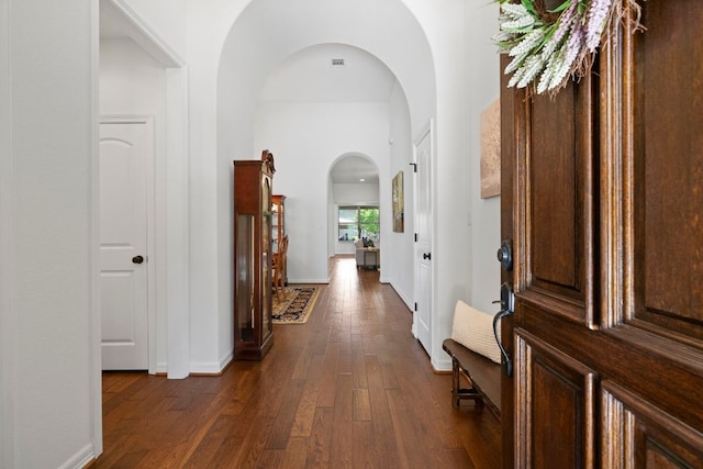 139 Merion Dr, Austin, TX 78737 - foyer entrance featuring arched walkways and dark wood finished floors