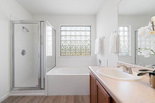 1431 Davis Mountain Loop, Cedar Park, TX 78613 - full bathroom with wood finished floors, plenty of natural light, vanity, and a stall shower