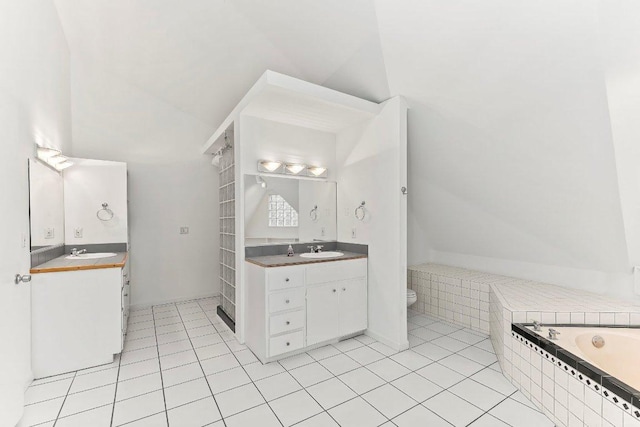 17226 Rocky Ridge Rd, Austin, TX 78734 - full bath featuring vanity, tiled bath, tile patterned floors, and lofted ceiling