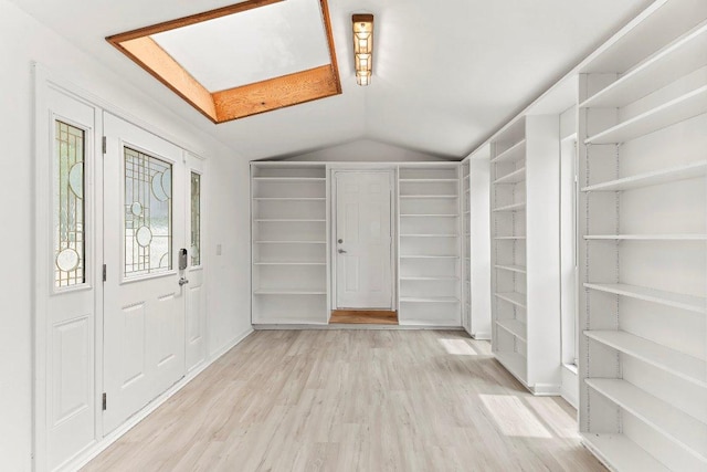17226 Rocky Ridge Rd, Austin, TX 78734 - foyer with lofted ceiling and wood finished floors