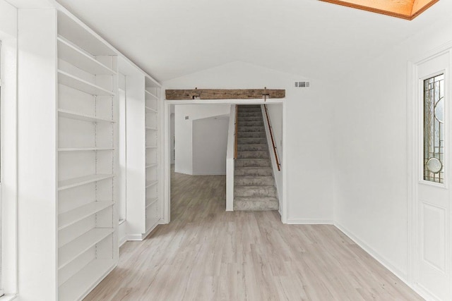 17226 Rocky Ridge Rd, Austin, TX 78734 - foyer entrance with wood finished floors and lofted ceiling